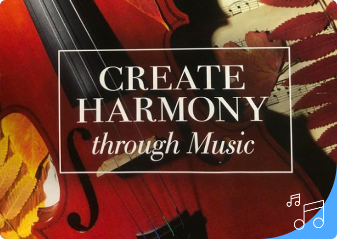 A close up of a violin with the words create harmony through music